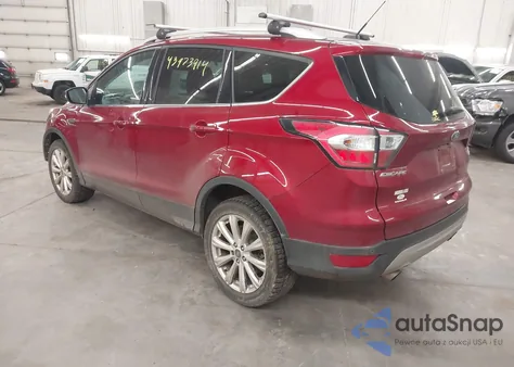 2017 Ford Escape Titanium z USA, uszkodzony, nr VIN 1FMCU9J91HUD59747
